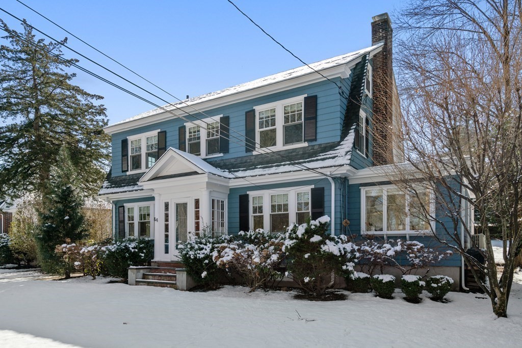 84 Moffat Road Newton, MA 02468 - Photo 4 of 39 a front view of a house with a garden