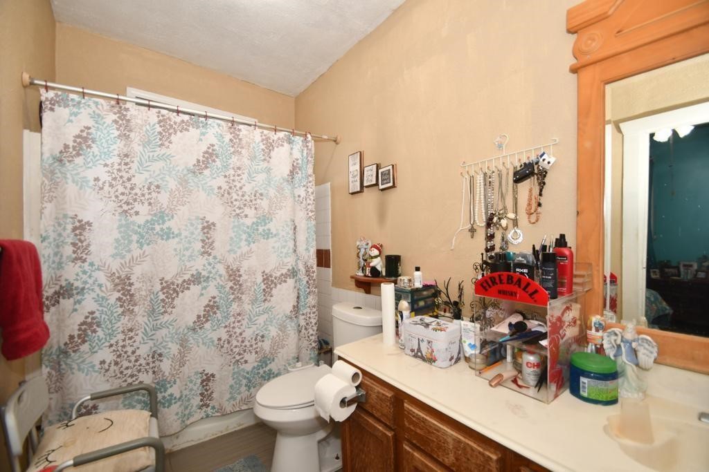 3908 Bering Street Houston, TX 77003 - Photo 13 of 21 a bathroom with a sink toilet and shower