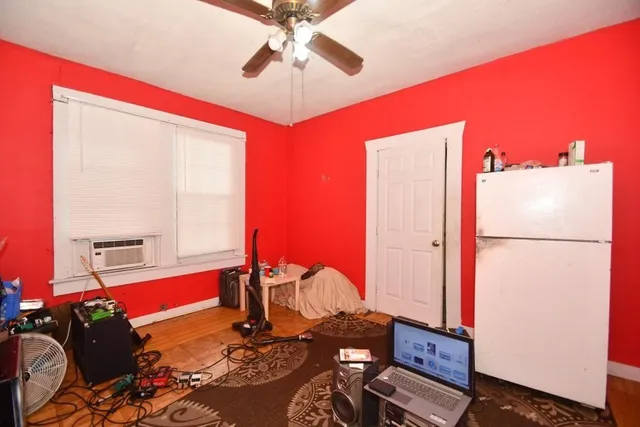 a room with furniture and a chandelier