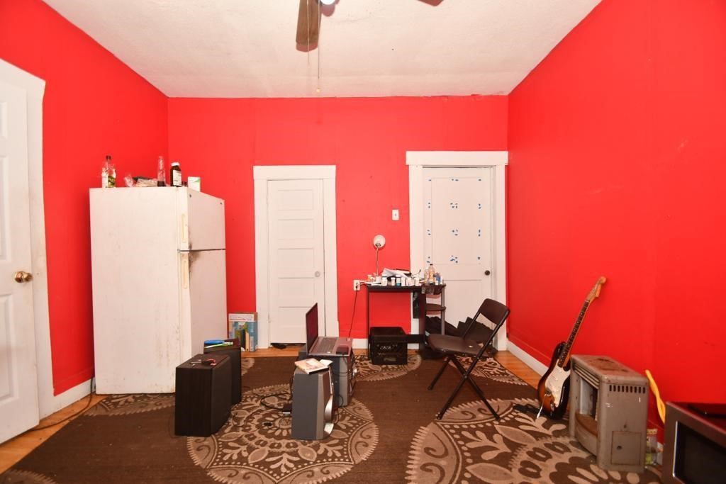 3908 Bering Street Houston, TX 77003 - Photo 19 of 21 a room with furniture and a lamp