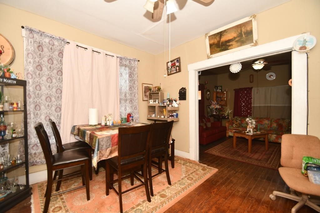 3908 Bering Street Houston, TX 77003 - Photo 8 of 21 a view of a dining room with furniture window and wooden floor