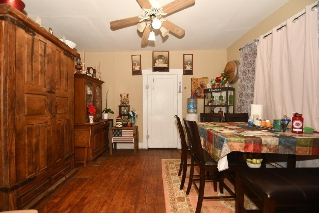 3908 Bering Street Houston, TX 77003 - Photo 9 of 21 a view of a dining room with furniture window and wooden floor