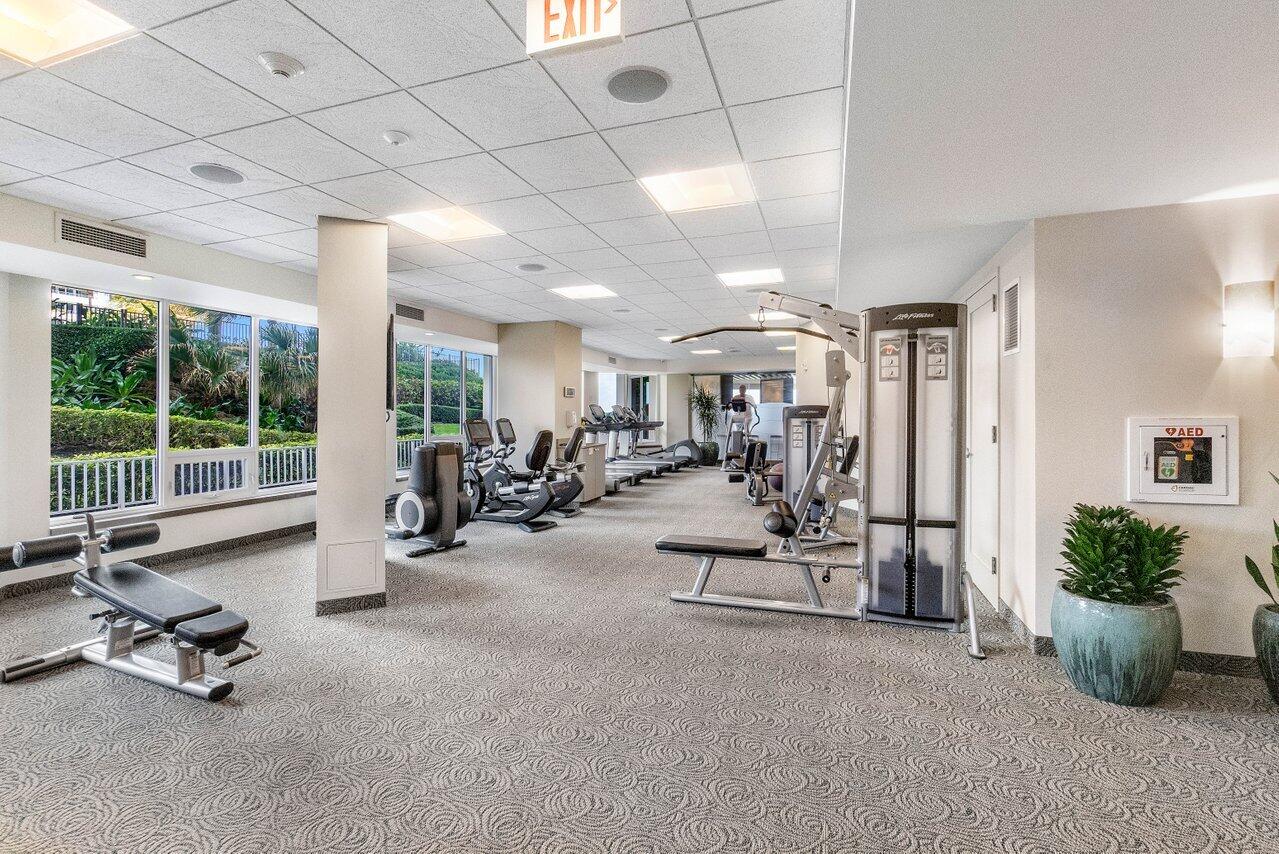 550 South Ocean Boulevard, Unit 1003/1001 Boca Raton, FL 33432 - Photo 60 of 66 a view of a room with gym equipment