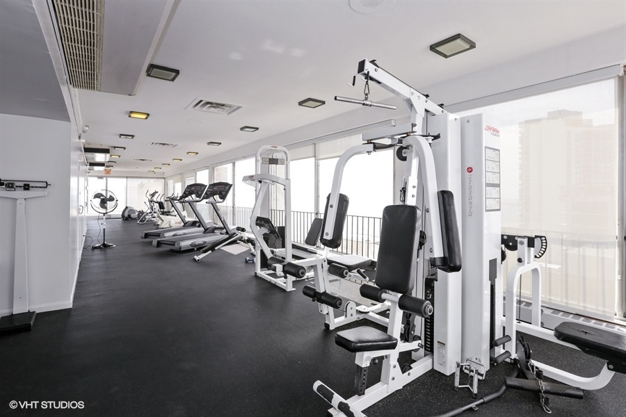 6171 North Sheridan Road, Unit 1107 Chicago, IL 60660 - Photo 12 of 18 a view of a room with gym equipment