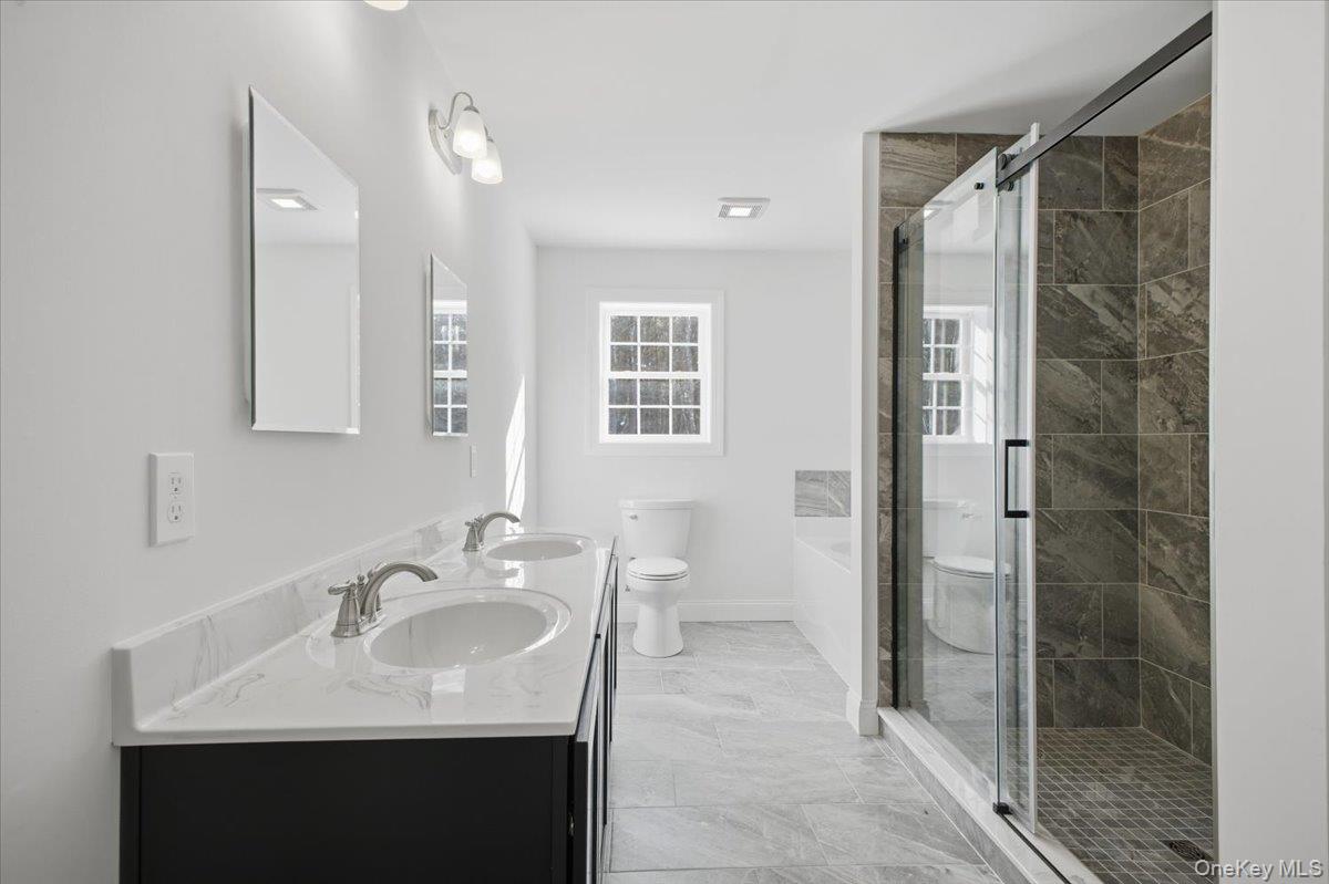196 Fawn Hill Road Prattsville, NY 12468 - Photo 28 of 48 a bathroom with a sink shower and a mirror