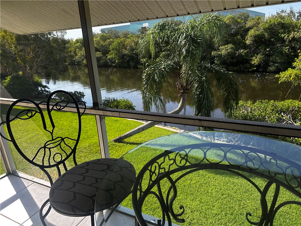 1815 Robalo Drive, Unit C201 Vero Beach, FL 32960 - Photo 11 of 31 a view of swimming pool from a balcony