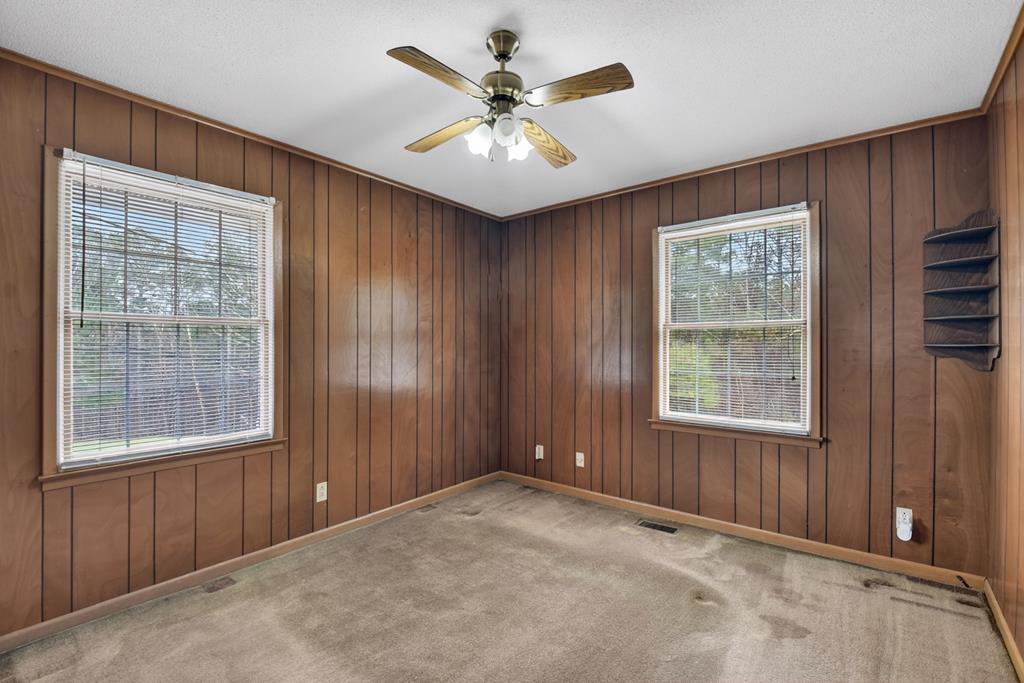 330 Colonial Avenue Copperhill, TN 37317 - Photo 29 of 37 an empty room with windows and ceiling fan