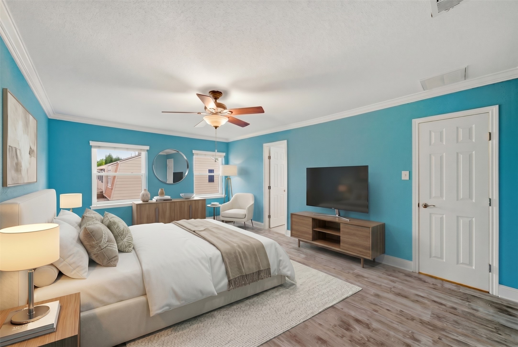 6452 Burgoyne Road, Unit 100 Houston, TX 77057 - Photo 22 of 44 a bedroom with a bed and a flat screen tv