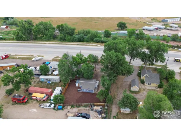 an aerial view of a house with a garden
