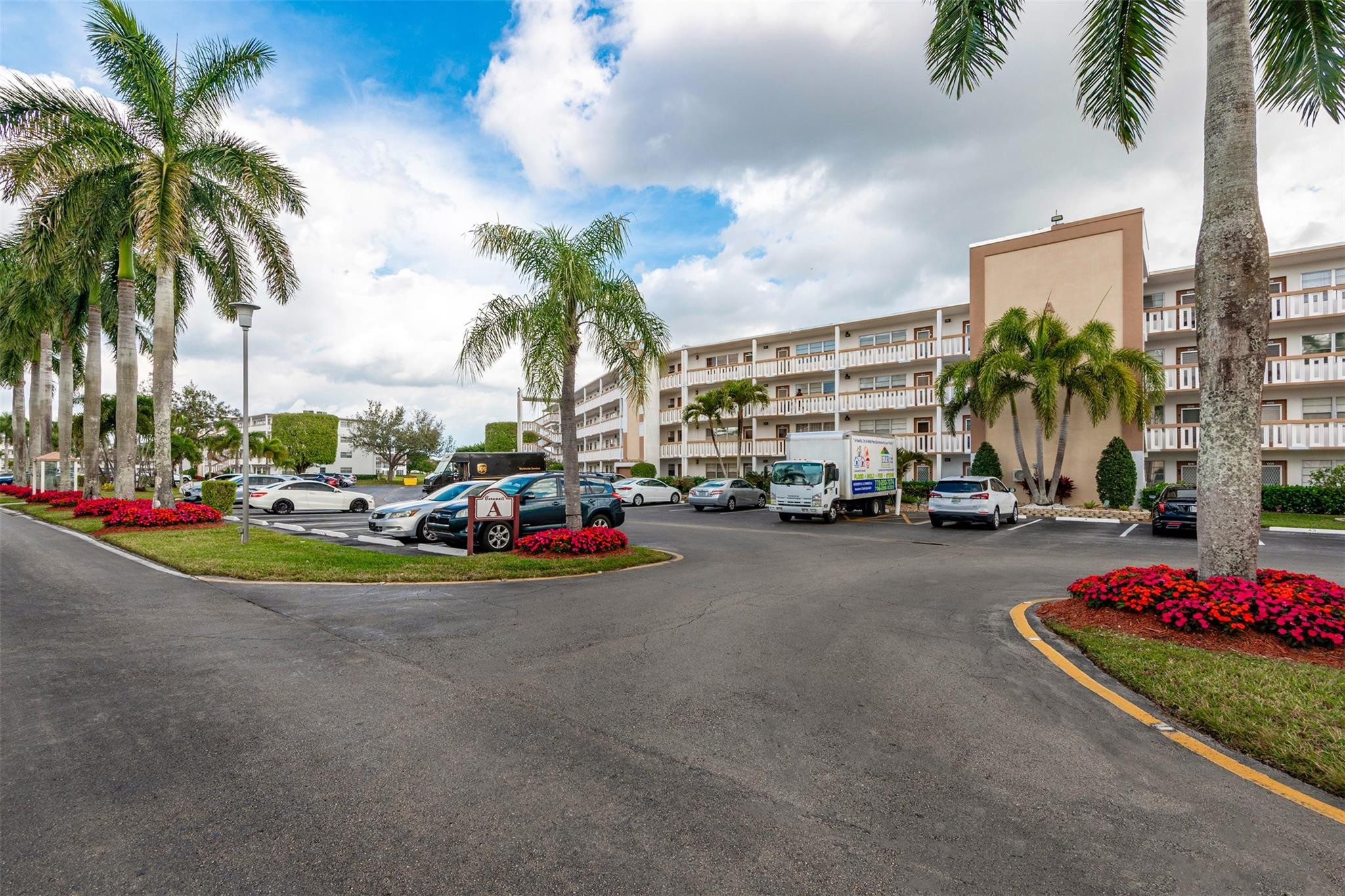 2009 Cornwall Drive, Unit 2009 Boca Raton, FL 33434 - Photo 23 of 23 a view of a street with cars