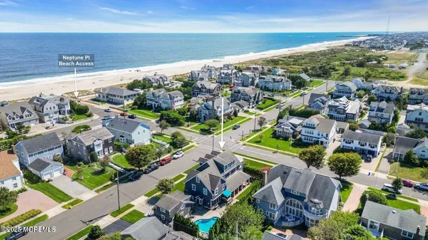 a large kitchen with lots of counter top space and stainless steel appliances