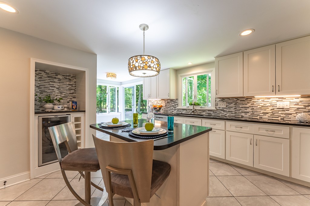 220 Hibiscus Drive Rochester, NY 14618 - Photo 10 of 50 The kitchen is the true hub of the home.