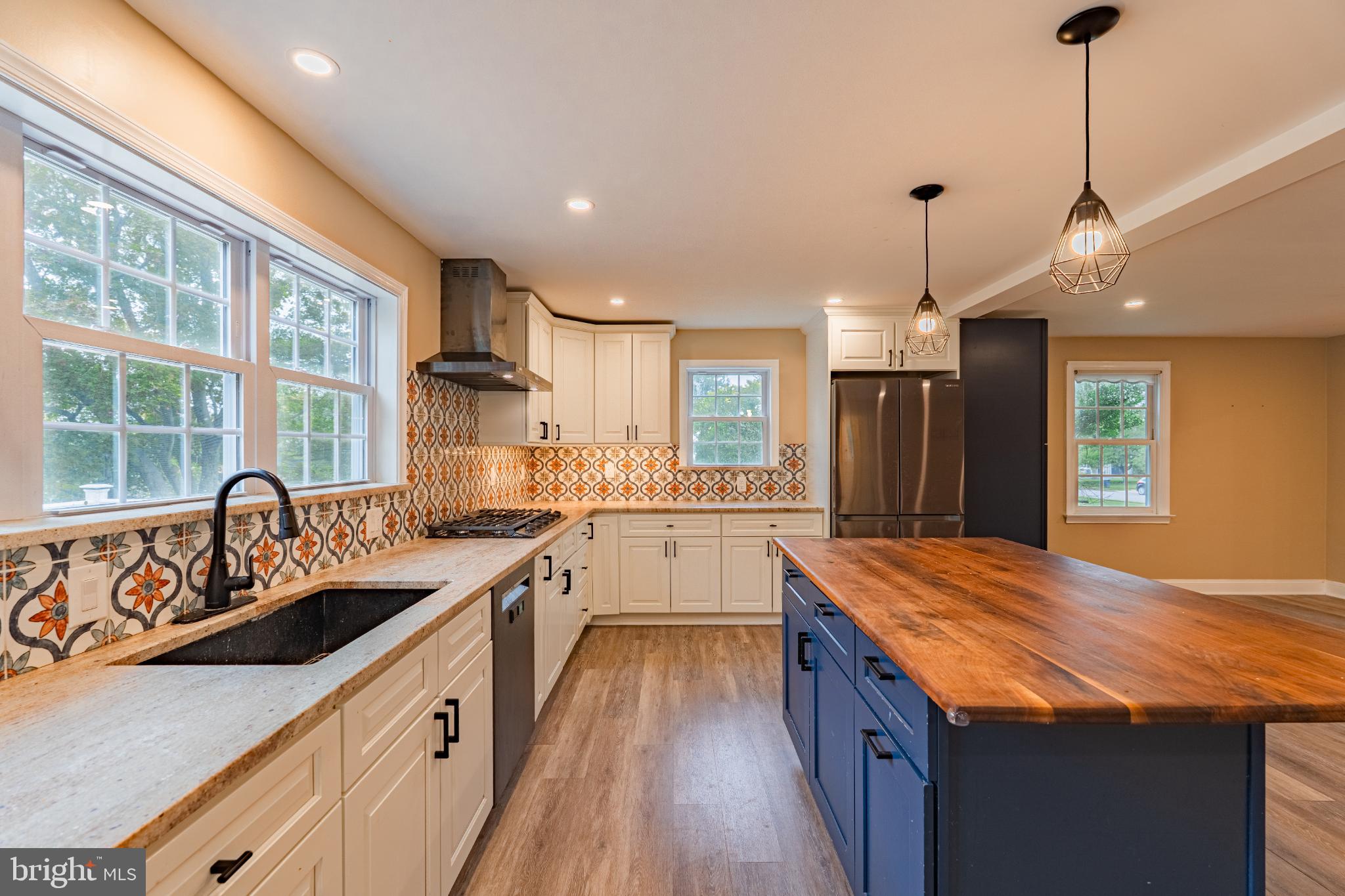 604 Arlingham Road Flourtown, PA 19031 - Photo 8 of 30 a kitchen with counter top space a sink appliances and cabinets