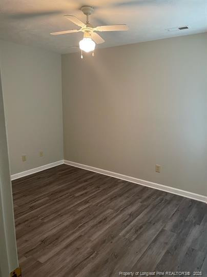 1189 Landau Road Fayetteville, NC 28311 - Photo 13 of 17 a view of a room with wooden floor and a ceiling fan