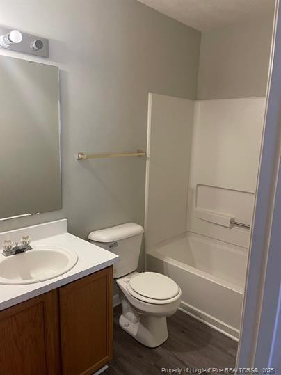1189 Landau Road Fayetteville, NC 28311 - Photo 15 of 17 a bathroom with a sink a toilet and shower
