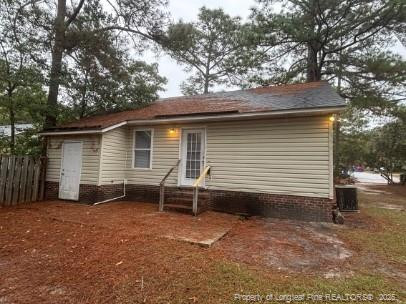 1189 Landau Road Fayetteville, NC 28311 - Photo 16 of 17 a view of house with backyard and a tree