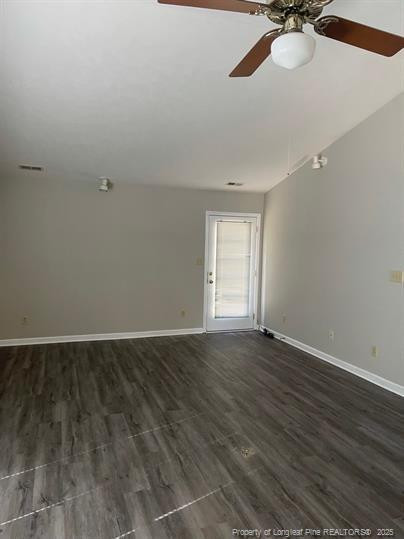 1189 Landau Road Fayetteville, NC 28311 - Photo 6 of 17 wooden floor in an empty room with a window