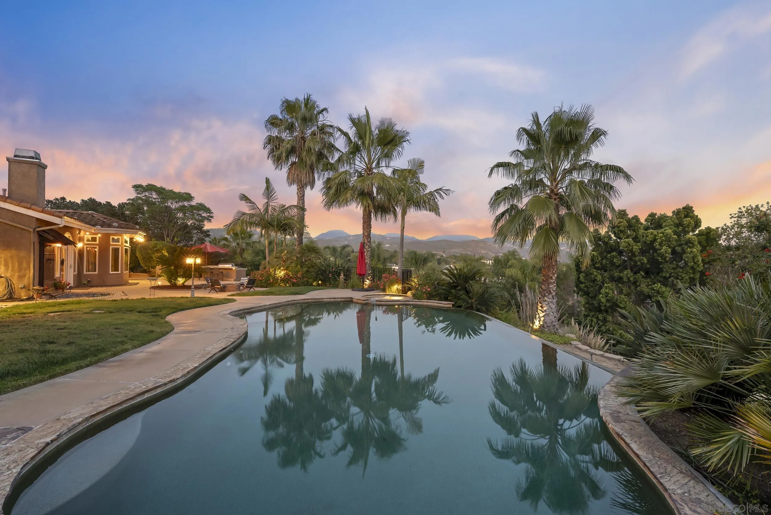 14998 Budwin Lane Poway, CA 92064 - Photo 2 of 44 a view of swimming pool from a lake view