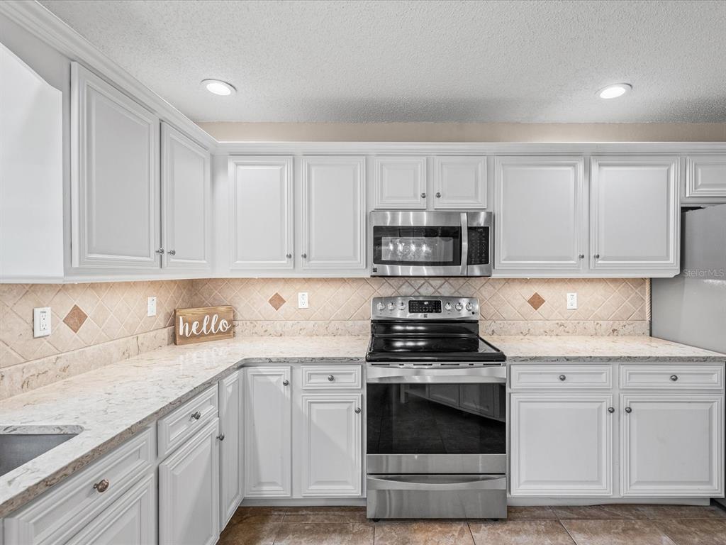 14204 Highgrove Road Spring Hill, FL 34609 - Photo 26 of 70 Gallery Image 26
