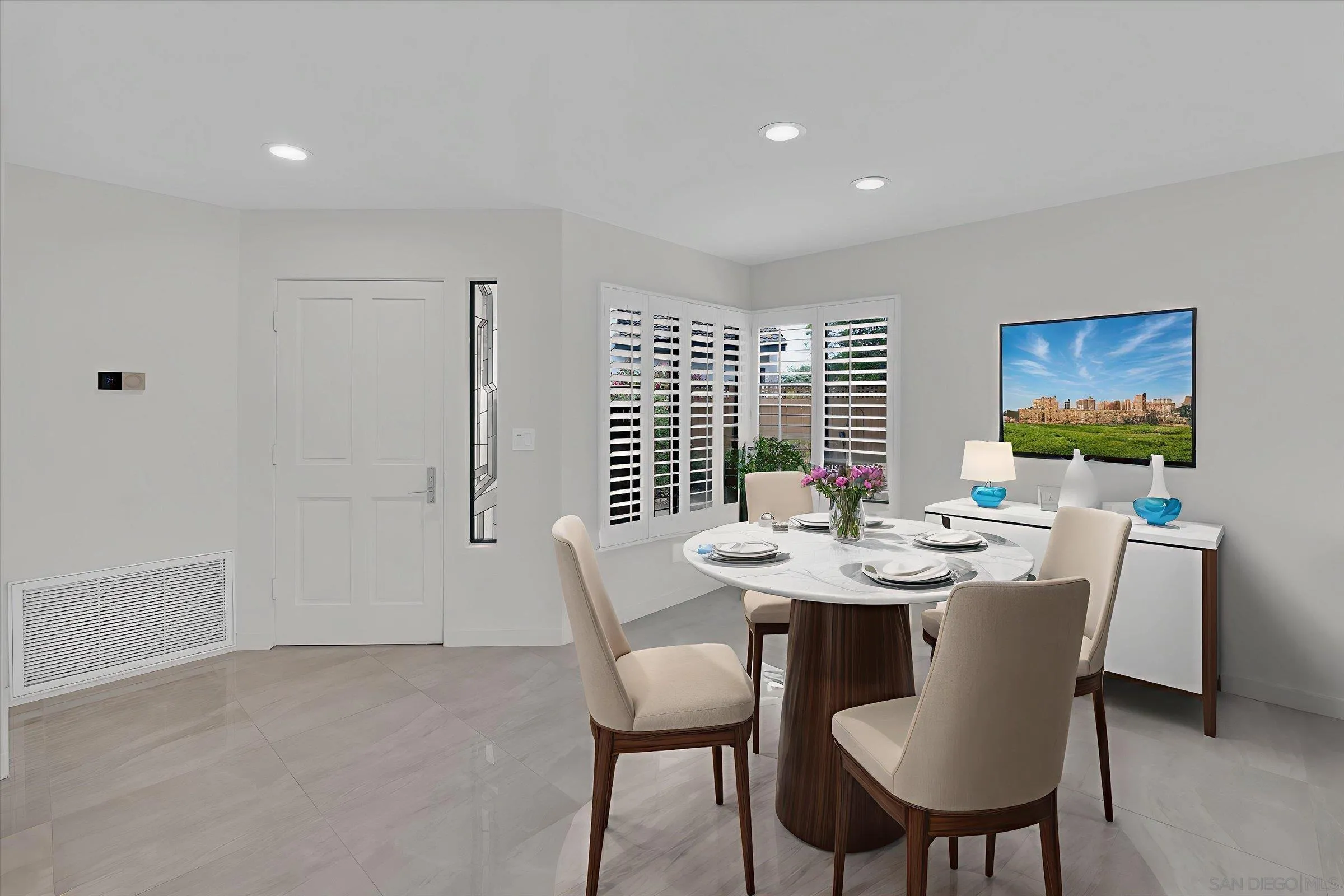 6426 Caminito Listo San Diego, CA 92111 - Photo 11 of 48 a view of a dining room with furniture