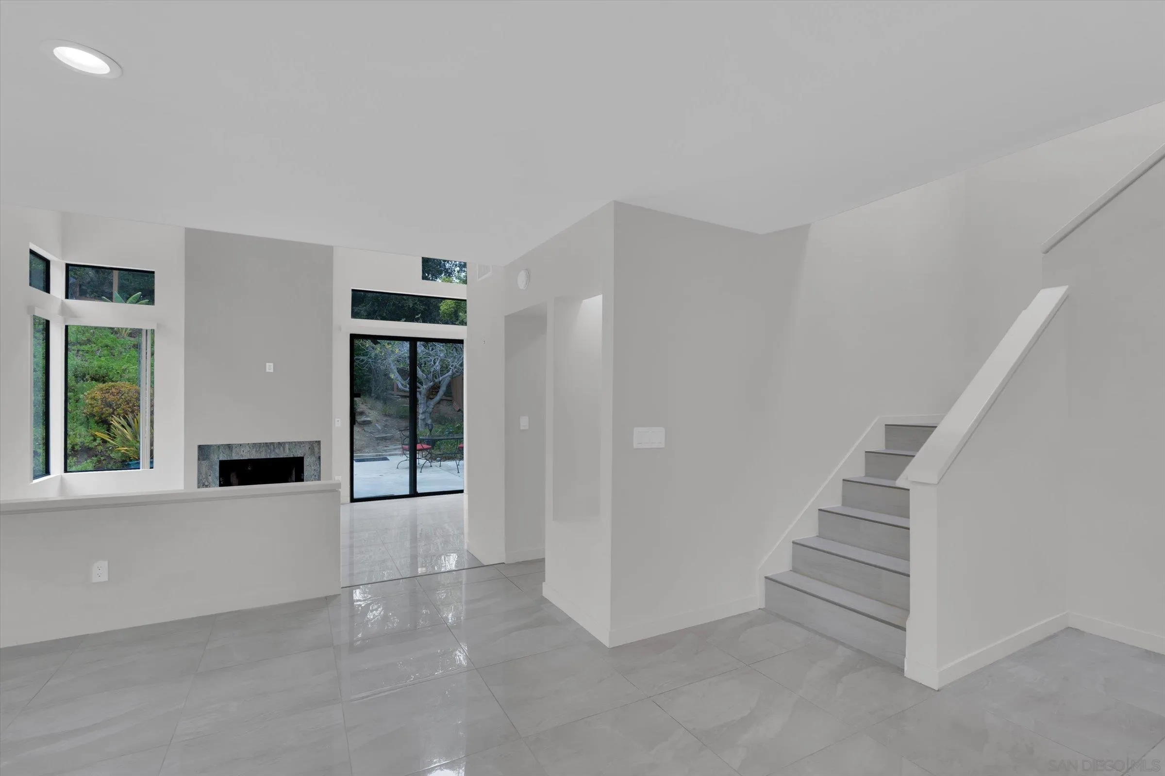 6426 Caminito Listo San Diego, CA 92111 - Photo 18 of 48 wooden floor in an empty room with a window