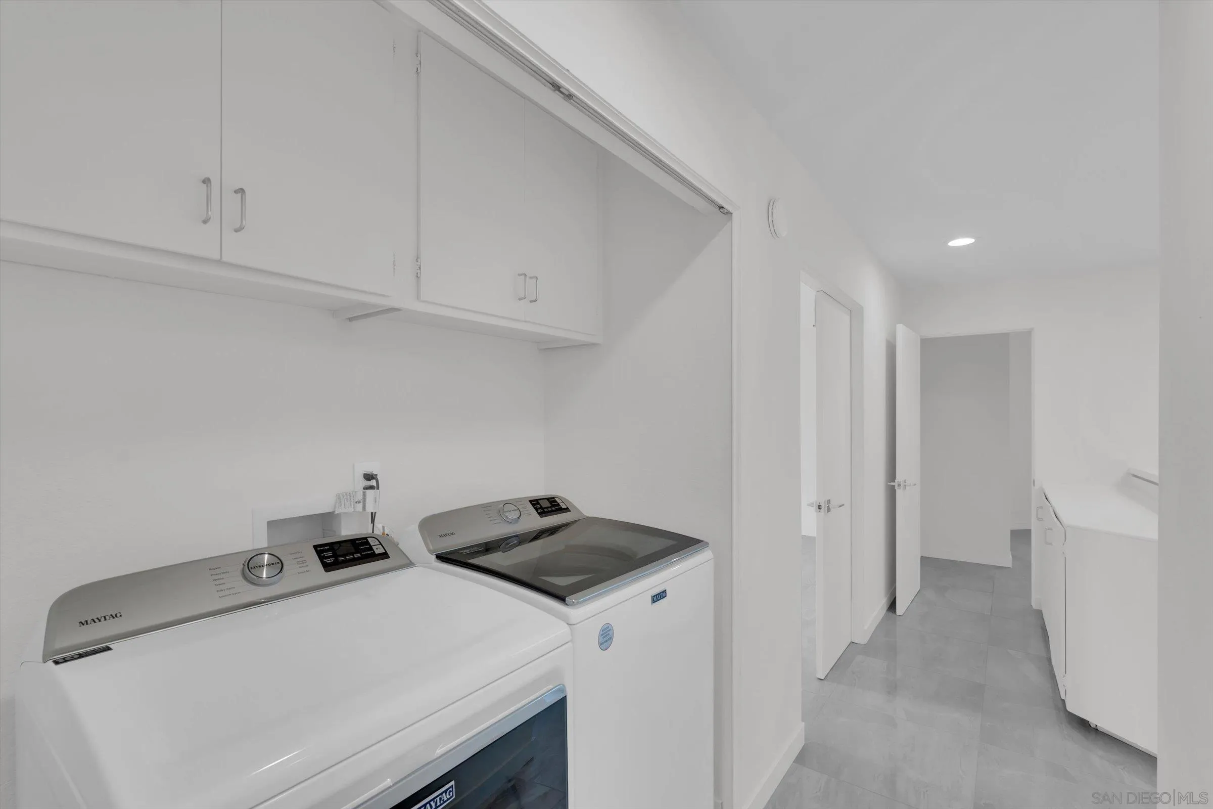 6426 Caminito Listo San Diego, CA 92111 - Photo 28 of 48 a utility room with dryer and washer