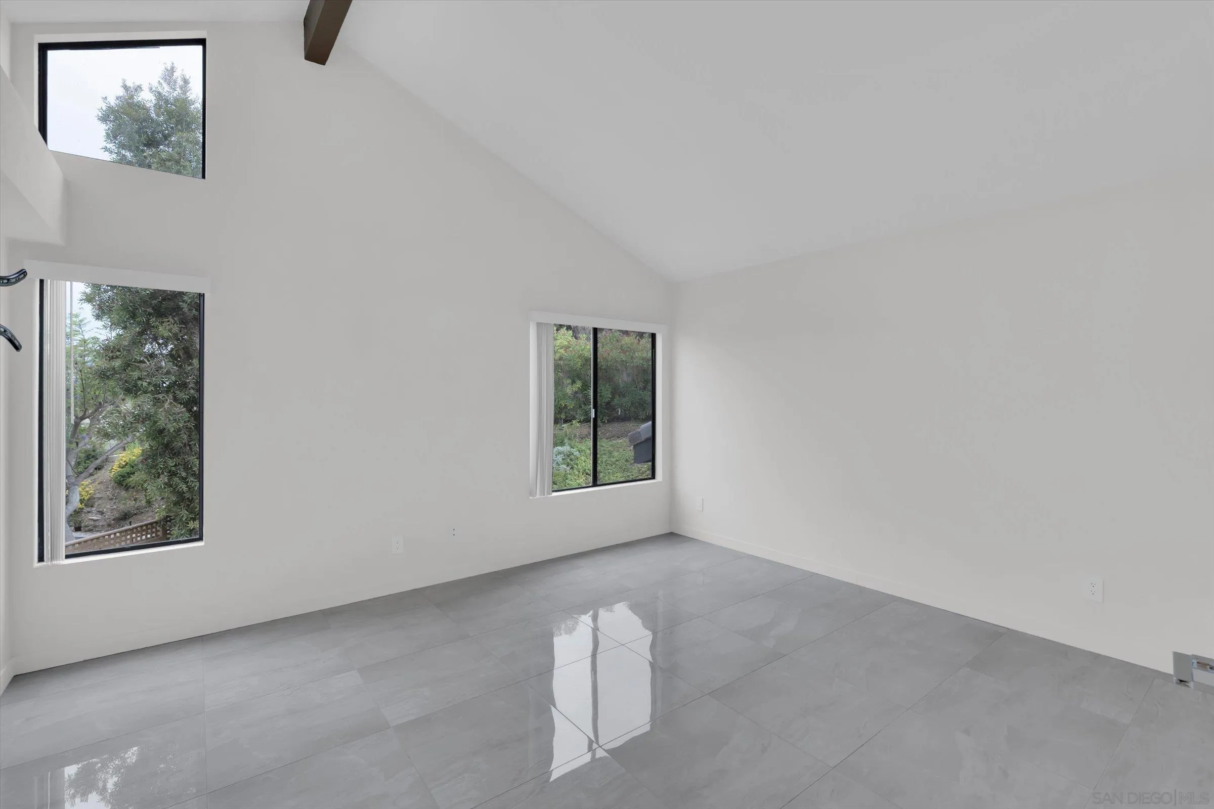 6426 Caminito Listo San Diego, CA 92111 - Photo 30 of 48 an empty room with windows
