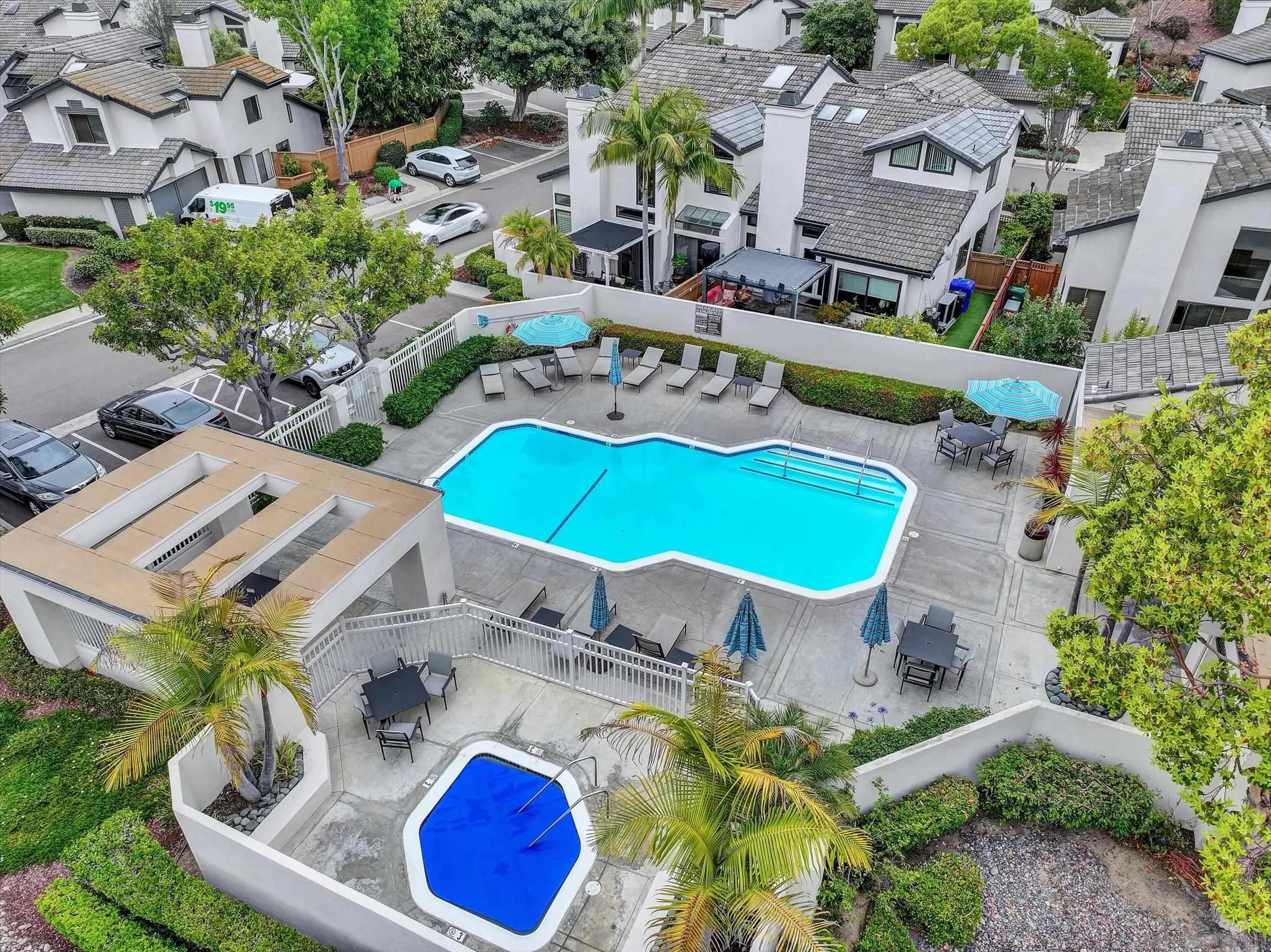6426 Caminito Listo San Diego, CA 92111 - Photo 3 of 48 an aerial view of a house with a swimming pool a yard and outdoor seating