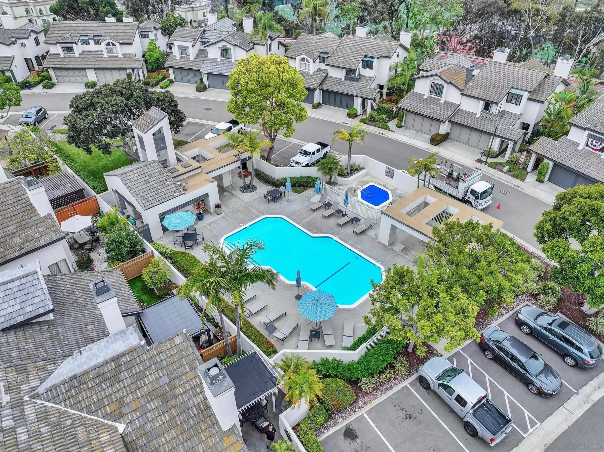 6426 Caminito Listo San Diego, CA 92111 - Photo 45 of 48 an aerial view of a house with a garden and mountain view