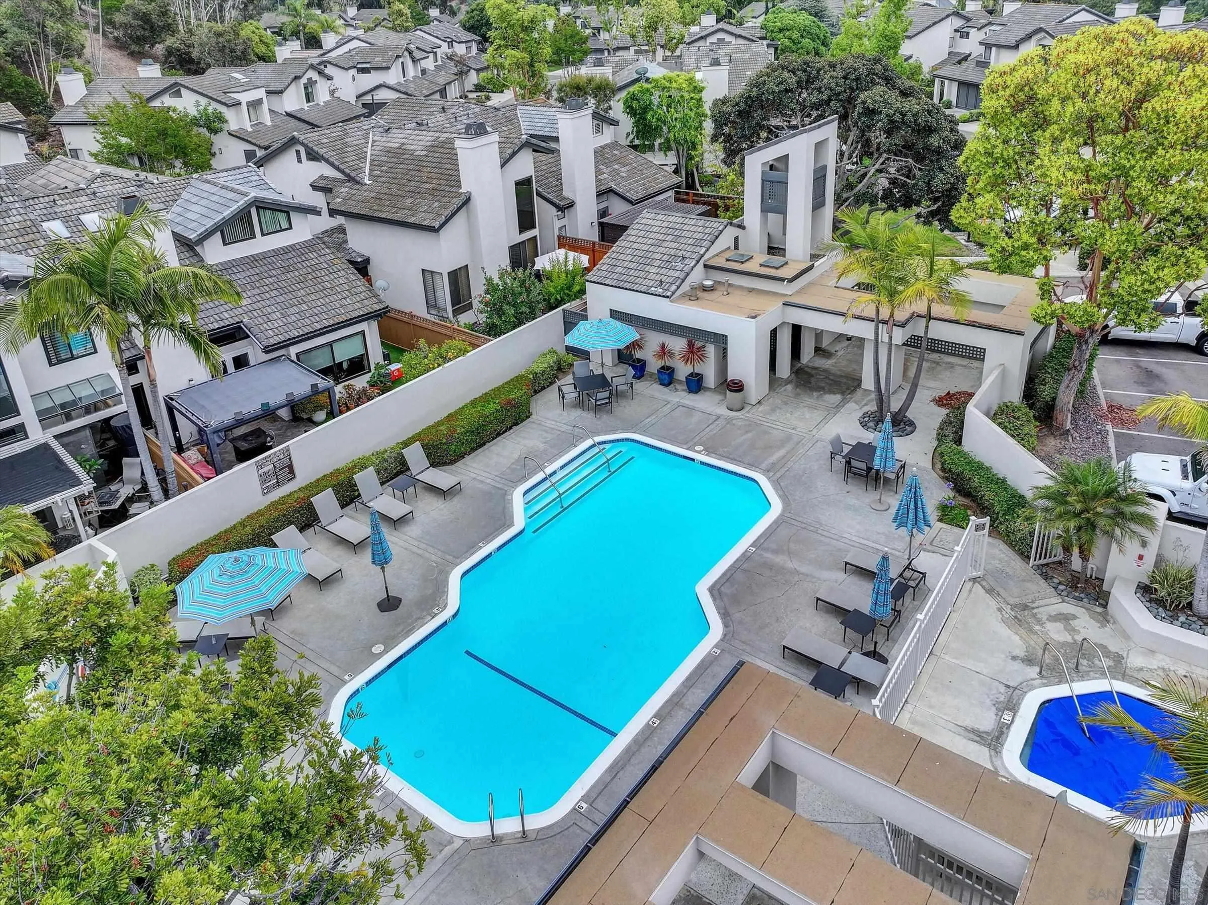 6426 Caminito Listo San Diego, CA 92111 - Photo 46 of 48 an aerial view of a house with pool and chairs
