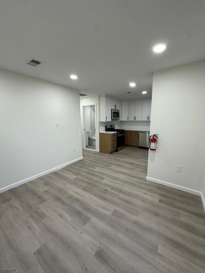 112 Fairview Avenue, Unit 2 Middlesex, NJ 08846 - Photo 16 of 29 a view of kitchen and a refrigerator in a room