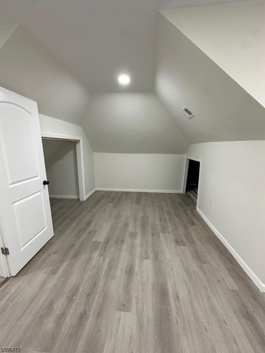 112 Fairview Avenue, Unit 2 Middlesex, NJ 08846 - Photo 20 of 29 a view of empty room with wooden floor
