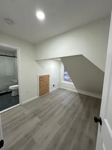 a bathroom with a toilet sink and a shower