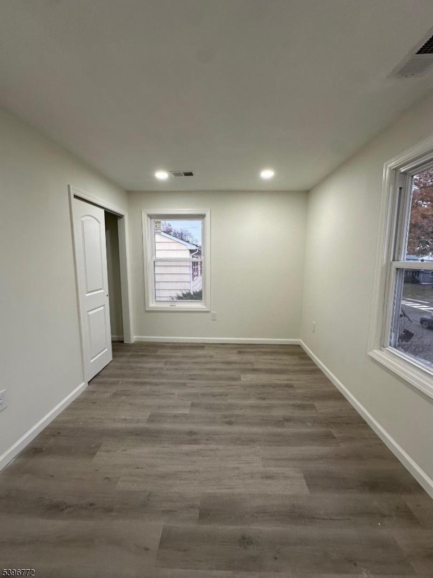112 Fairview Avenue, Unit 2 Middlesex, NJ 08846 - Photo 28 of 29 a view of an empty room and a window