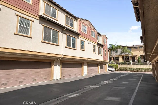 a view of a building with a street