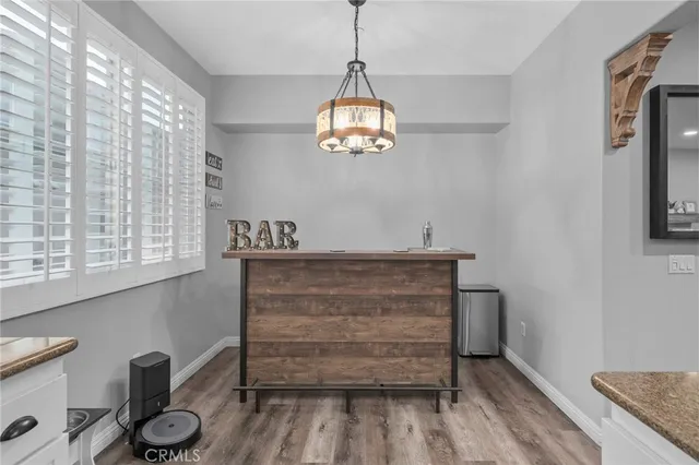 a view of entryway with kitchen