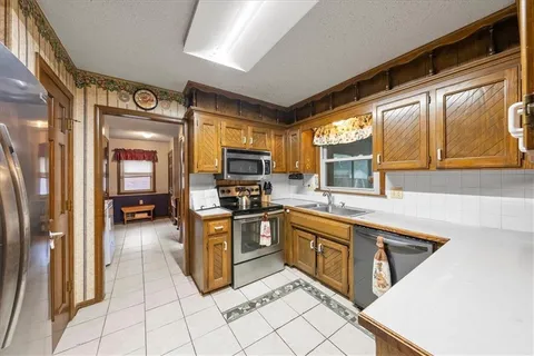 $302,450 | 1004 Southeast 3rd Terrace, Lee's Summit, MO 64063