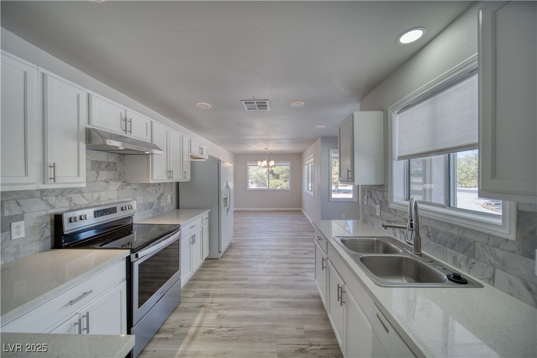 561 Jarvis Road Pahrump, NV 89060 - Photo 15 of 64 Recessed ceiling lights w/ backlit/night light option.