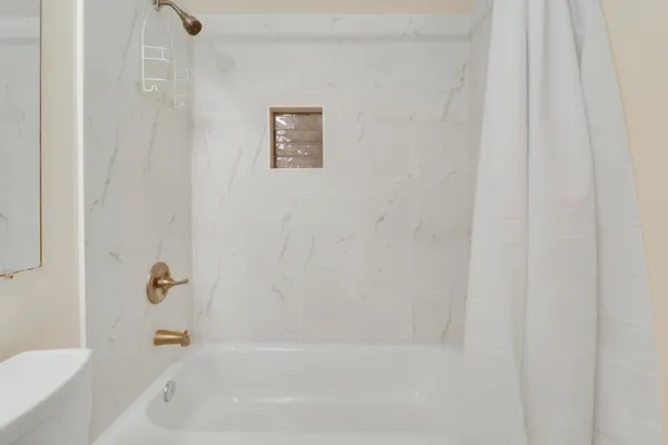 a bathroom with a bathtub