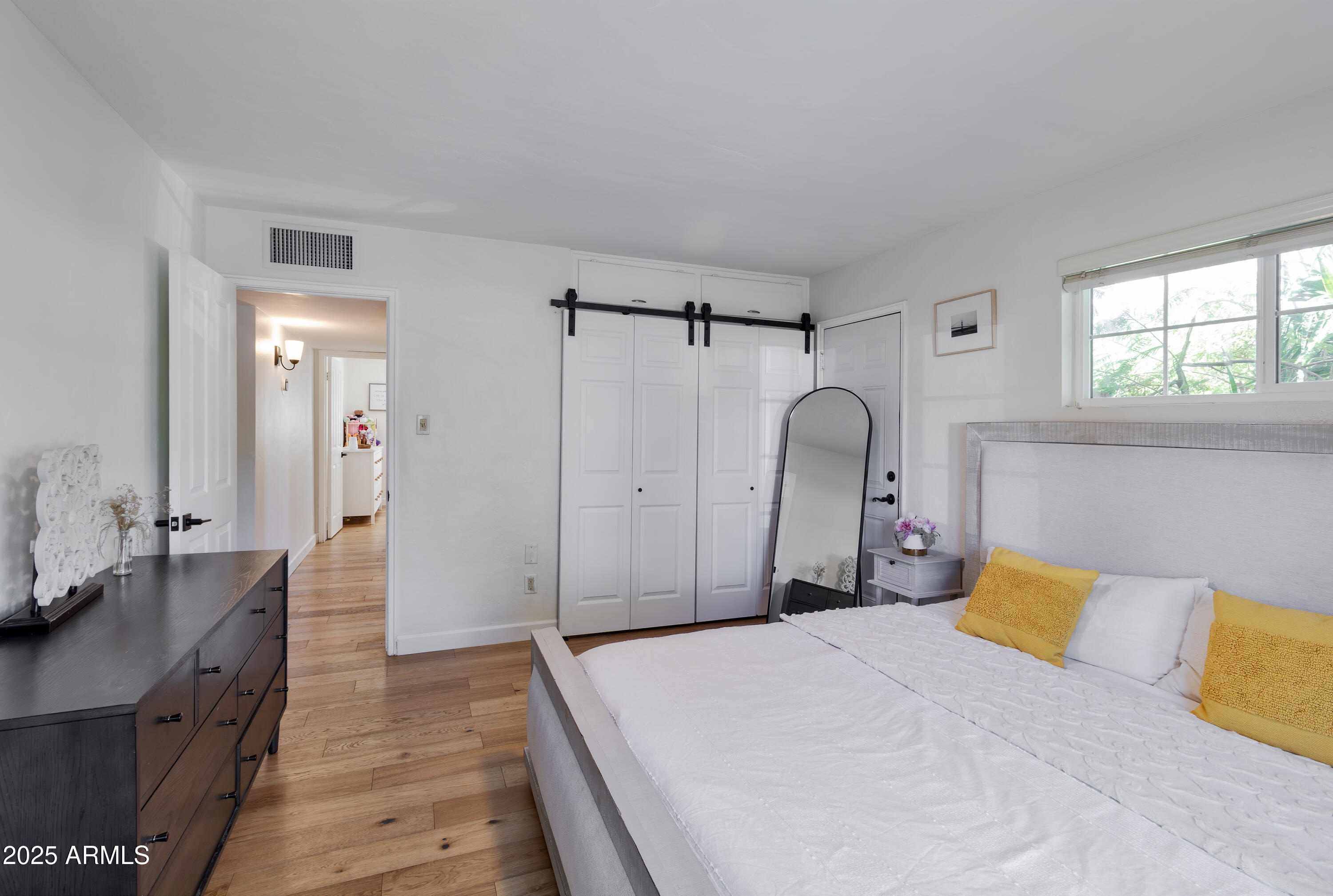 1903 East Palo Verde Drive Phoenix, AZ 85016 - Photo 13 of 25 a bedroom with a bed dresser and a window