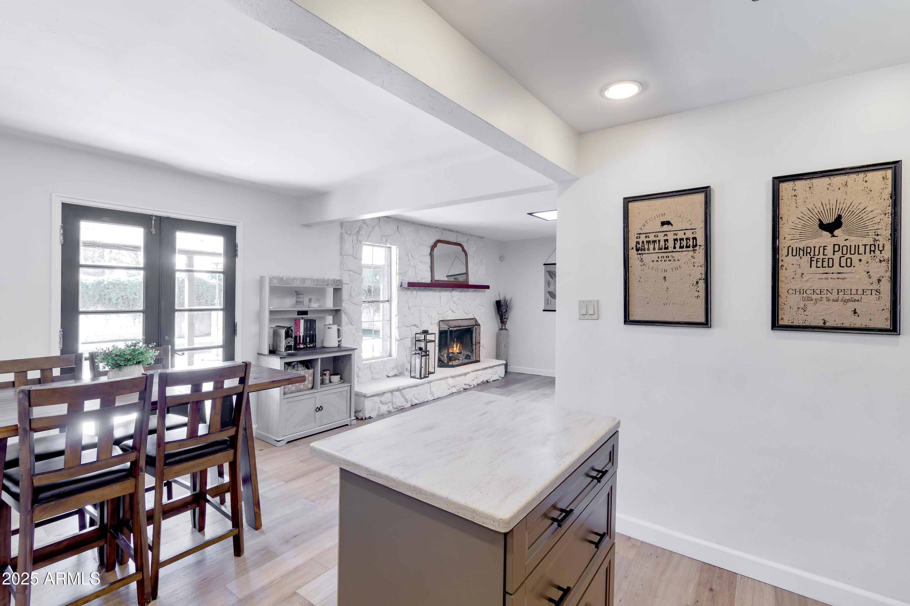 1903 East Palo Verde Drive Phoenix, AZ 85016 - Photo 8 of 25 a living room with furniture a flat screen tv and a fireplace