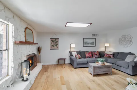 a living room with furniture or couch and a window