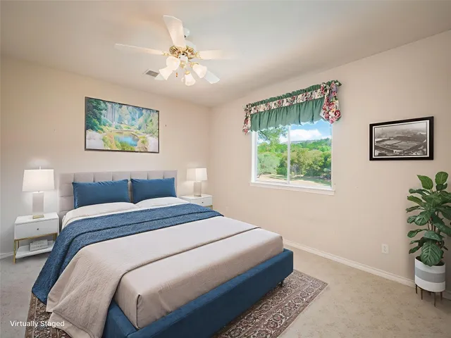 a bathroom with a double vanity sink and mirror