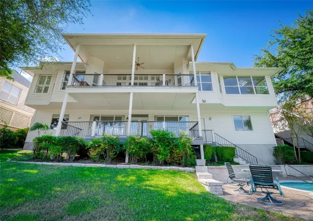 a view of a backyard of a house