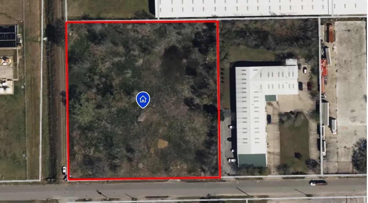 8665 Scranton Street Houston, TX 77075 - Photo 4 of 6 a sign that is on the side of a road