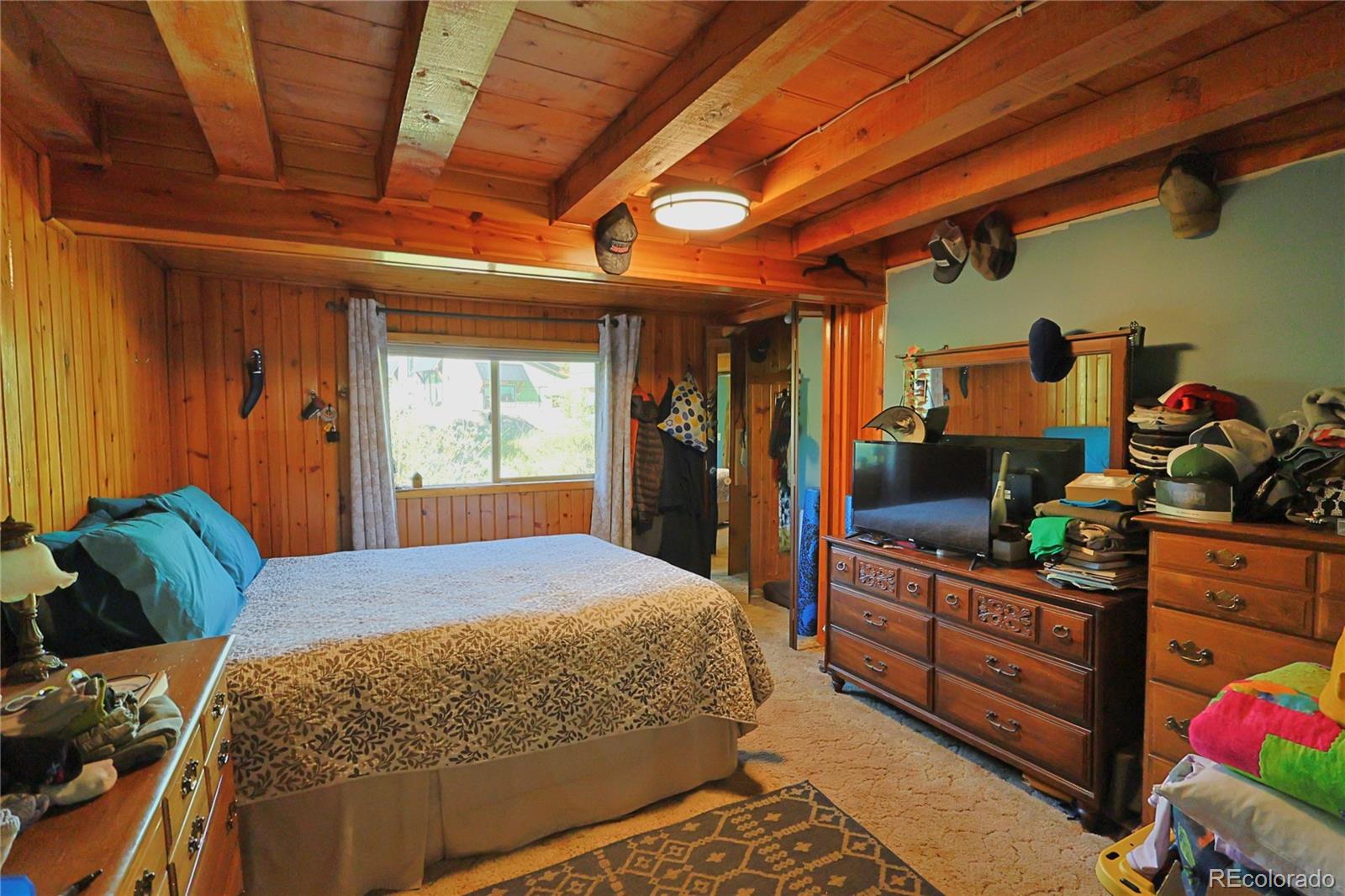 420 Quartz Lane Pitkin, CO 81241 - Photo 15 of 40 a bed room with a bed and a window