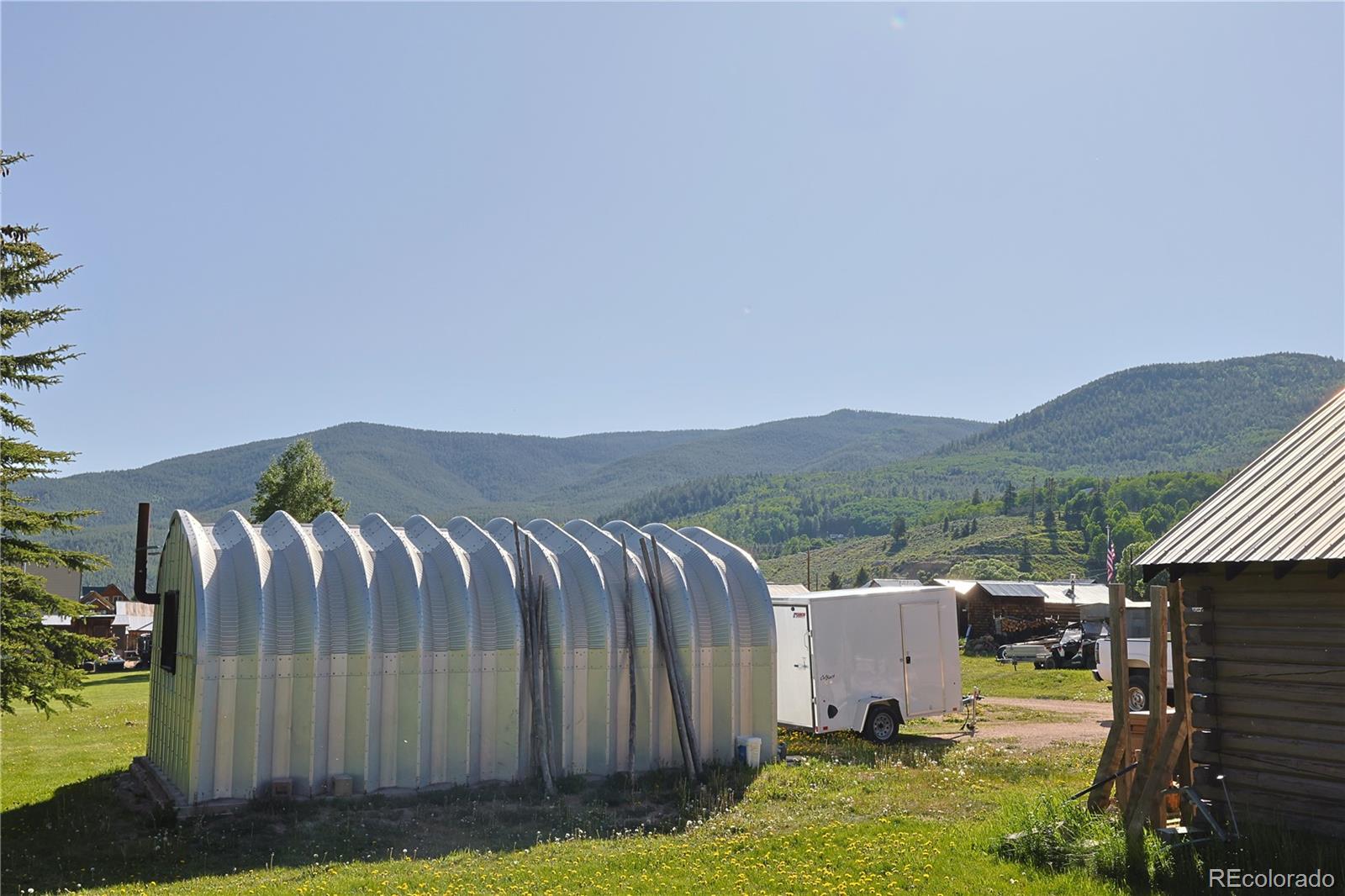 420 Quartz Lane Pitkin, CO 81241 - Photo 29 of 40 a view of a balcony with yard and mountain view in back
