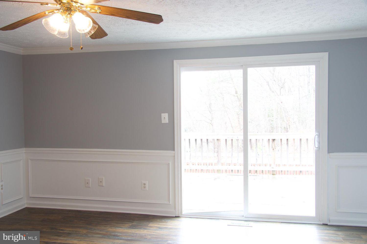 1831 Tilletson Place Woodbridge, VA 22191 - Photo 6 of 18 a view of a livingroom with an empty space & a window