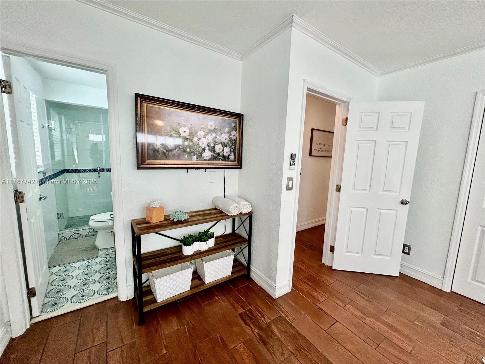 316 Walnut Street, Unit 1 Hollywood, FL 33019 - Photo 10 of 15 a living room with furniture and a wooden floor