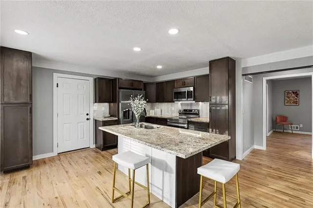 $394,900 | 12414 Valley Brook Drive, Grandview, MO 64030